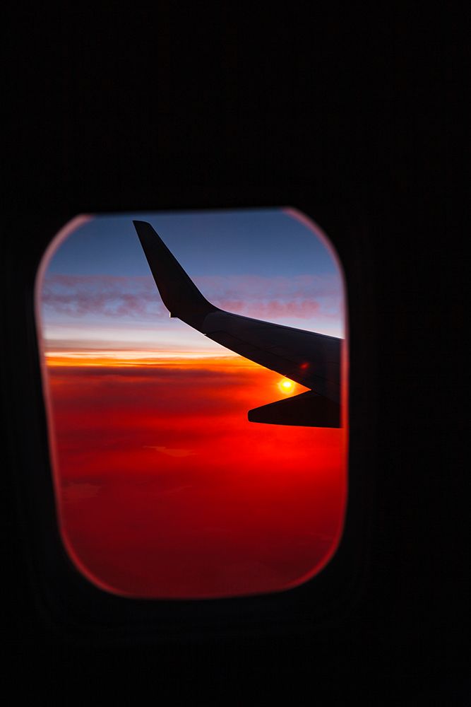Aerial sunset view from airplane window above California, USA